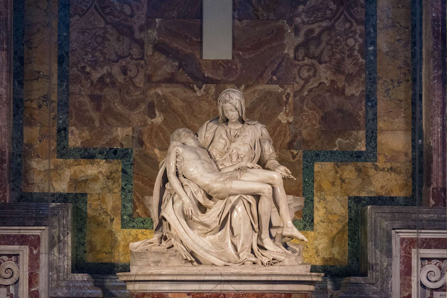 Michelangelo's La Pieta showing Mary holding Jesus' dead body