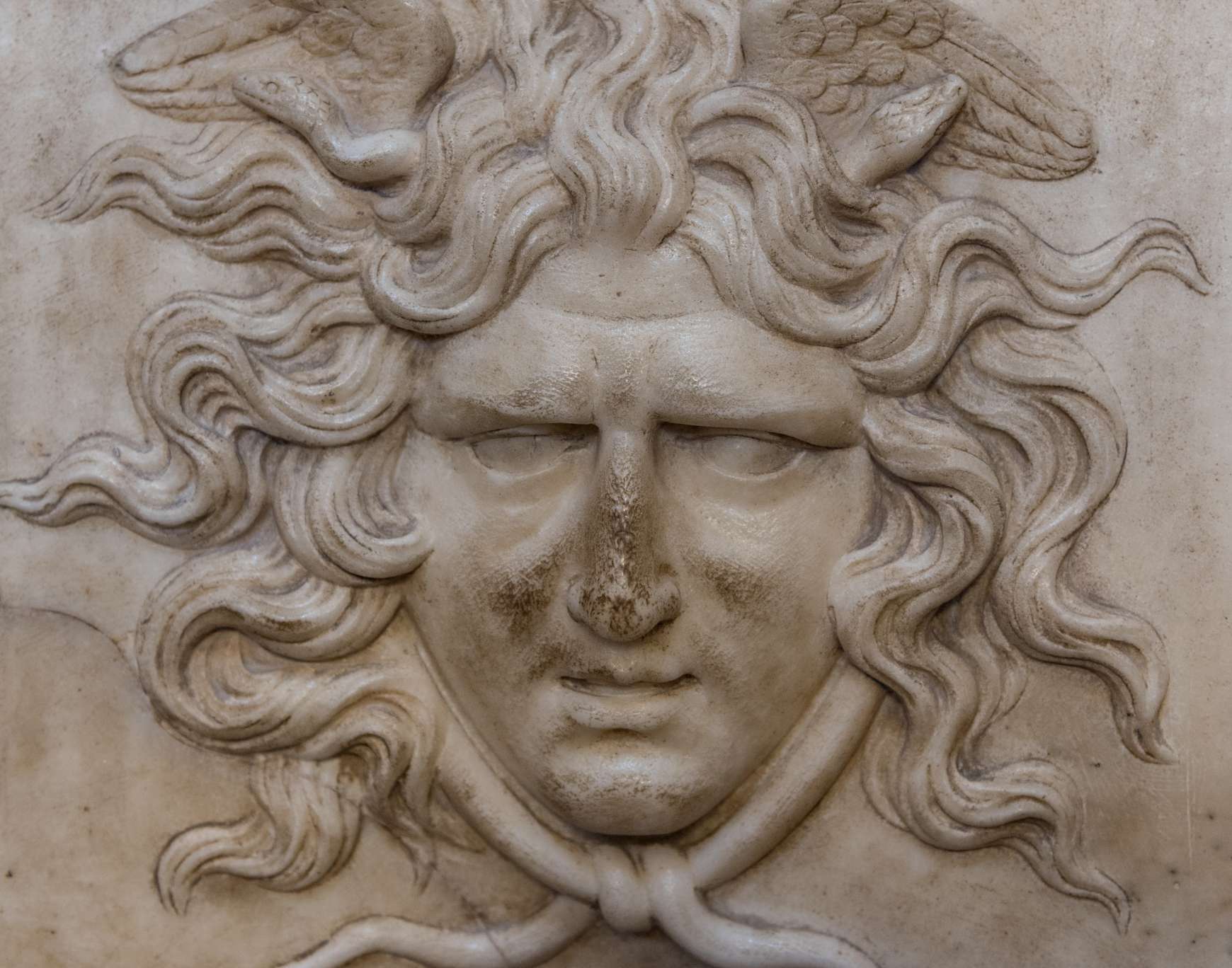 Detail of face on plaster decoration at Roman Villa