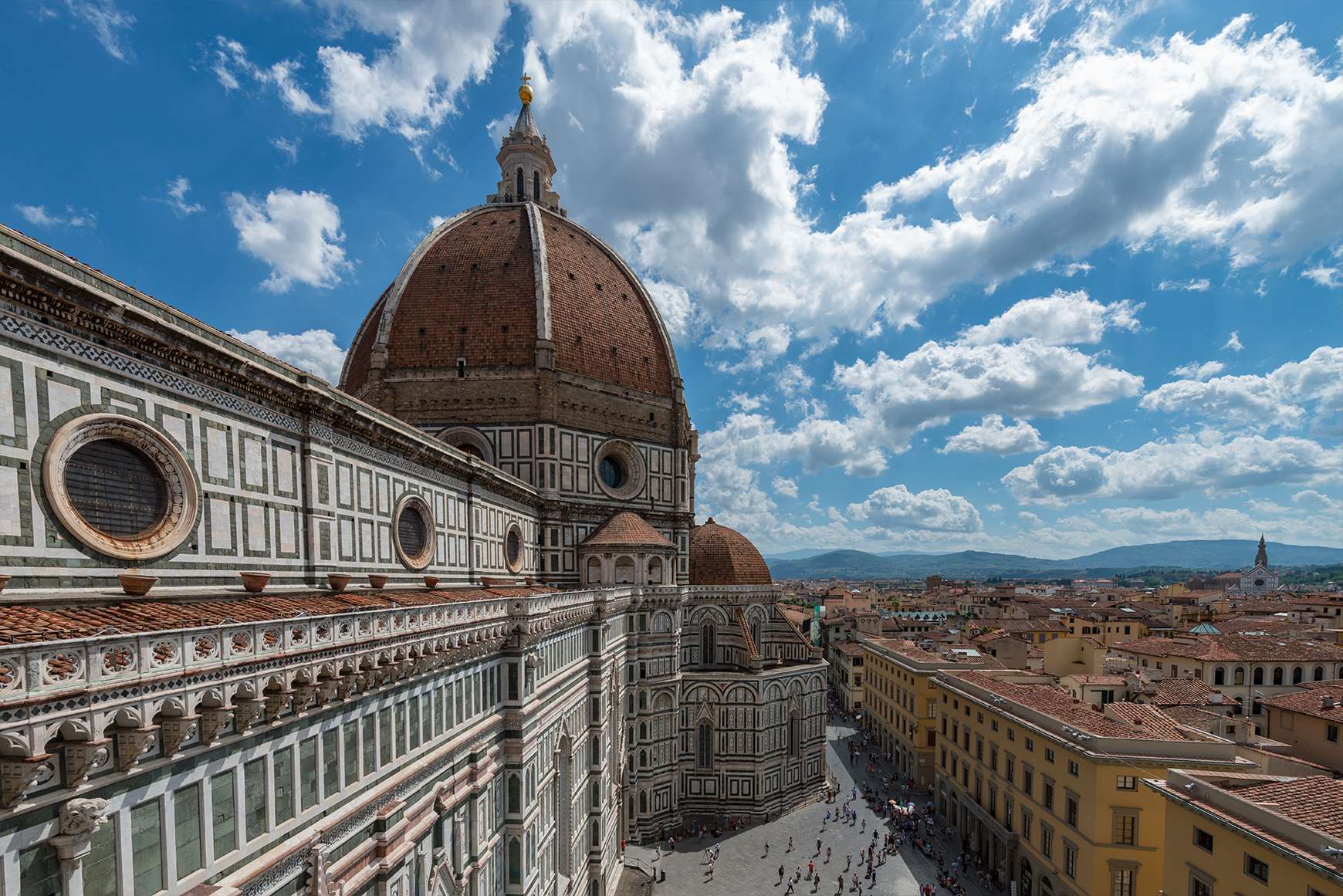 Colorful marble facade and dome of the Cathedral in Florence, Italy