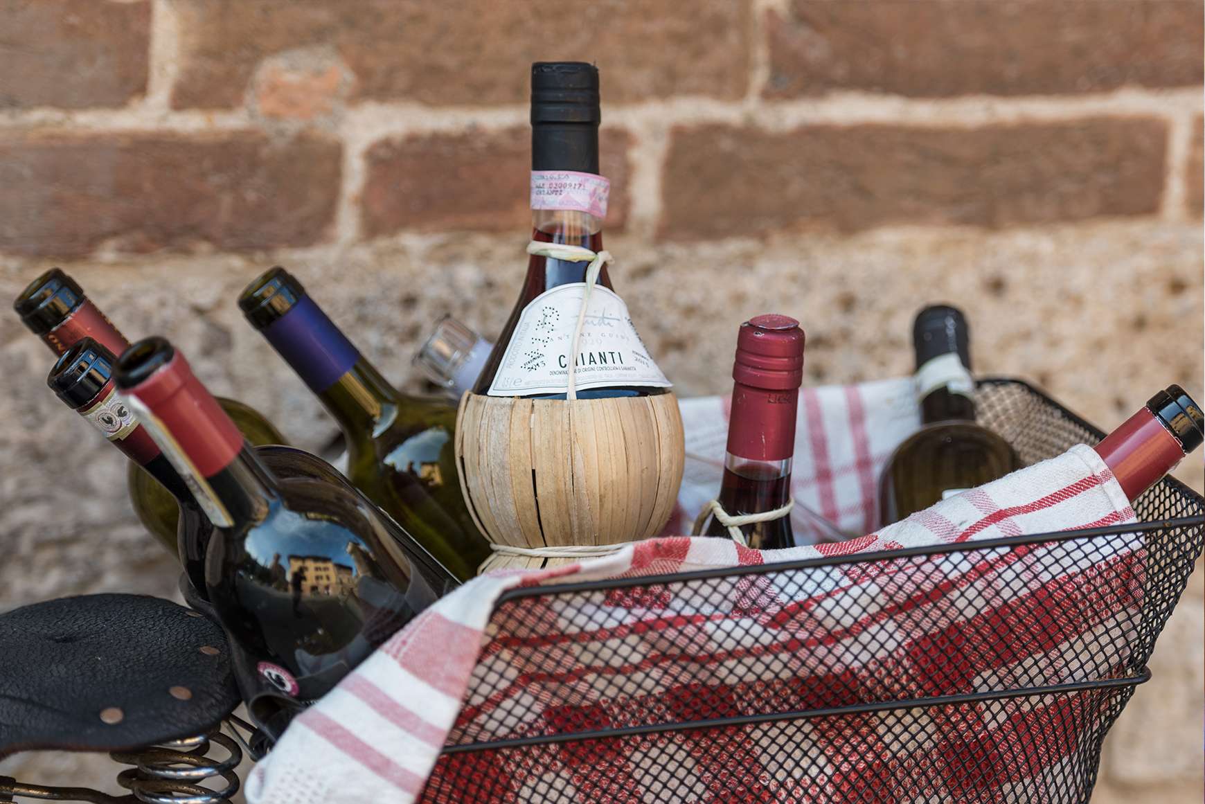 Bottles of wine in a basket from the Chianti Region of Italy