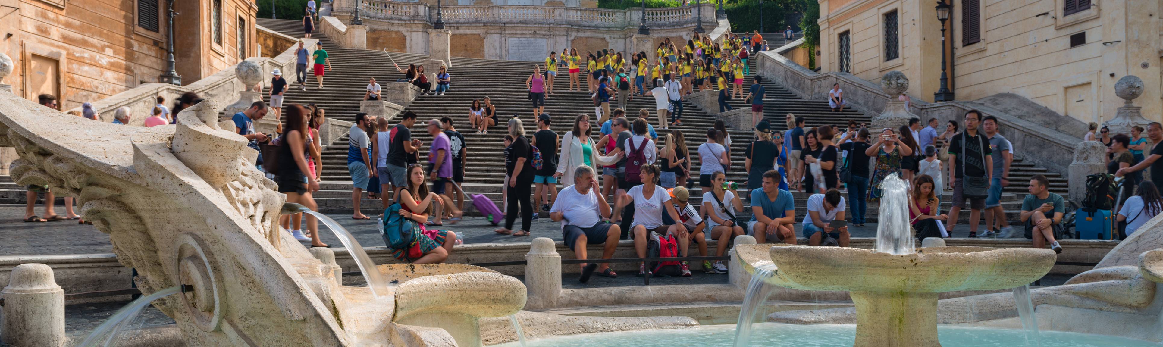 Close up of visitors sitting on the Spanish Steps in Rome
