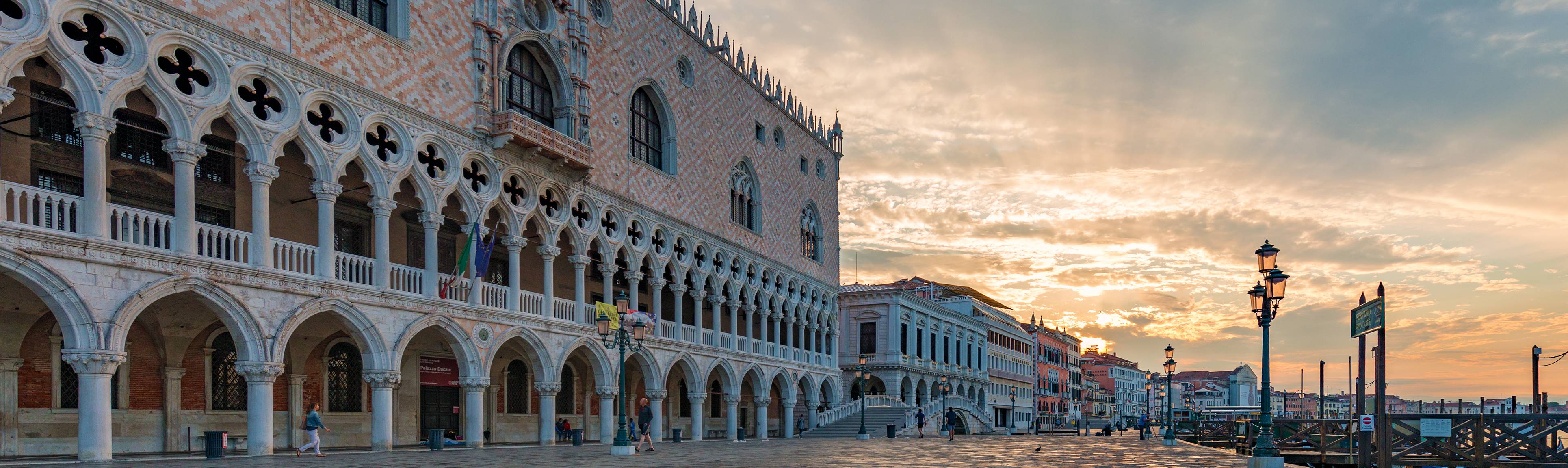 Sunset view of the arched building flanking Piazza San Marco in Venice
