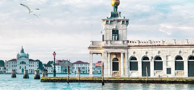 View of Punta della Dogana's art center jutting out into the water in Venice