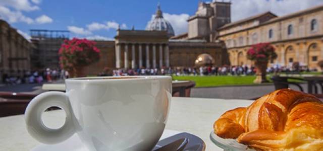 Coffee cup & cornetto in the Vatican Museum Courtyard in Rome