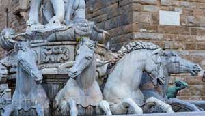 Horses carrying Neptune in fountain at Piazza della Signoria in Florence