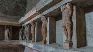 Statues lining the walls of a home in Pompeii 