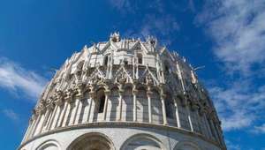 View of domed top of Pisa Baptistry in Pisa, Italy