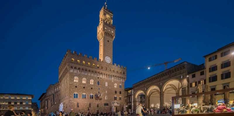Evening view of Piazza della Signoria and Palazzo Vecchio Tower in Florence